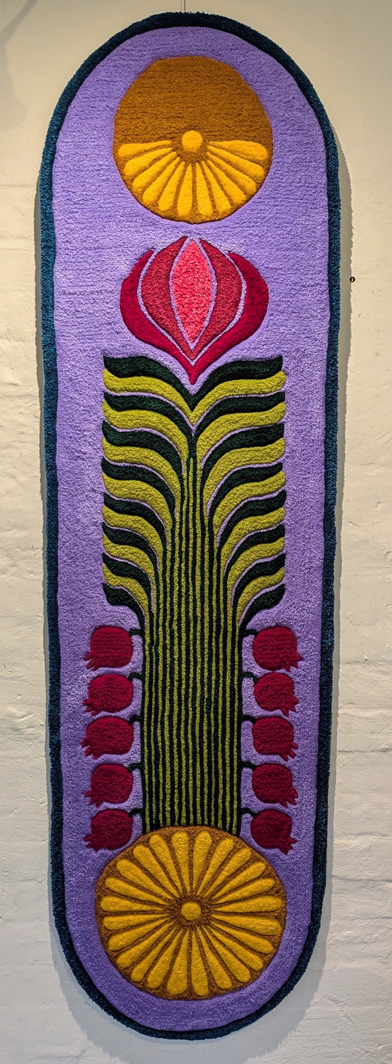 (2) Allanah Sarafian. Chrono-Nur (Pomegranate). 2025. Tufted yarn and timber board
