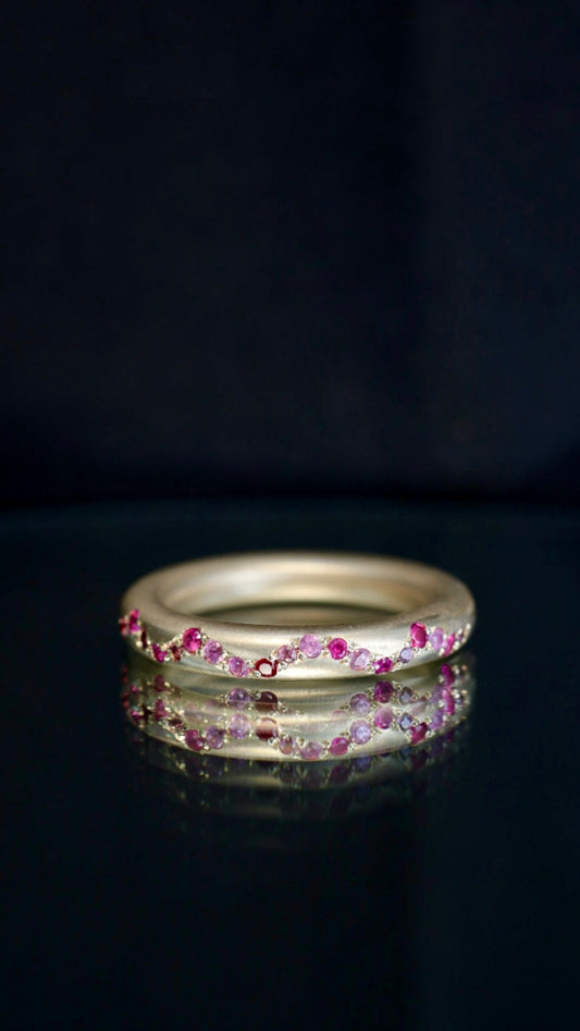 12. Robyn Clarke, Birrarung Ring 1, 3mm round 9ct yellow gold band with 19 x various pink sapphires, size N