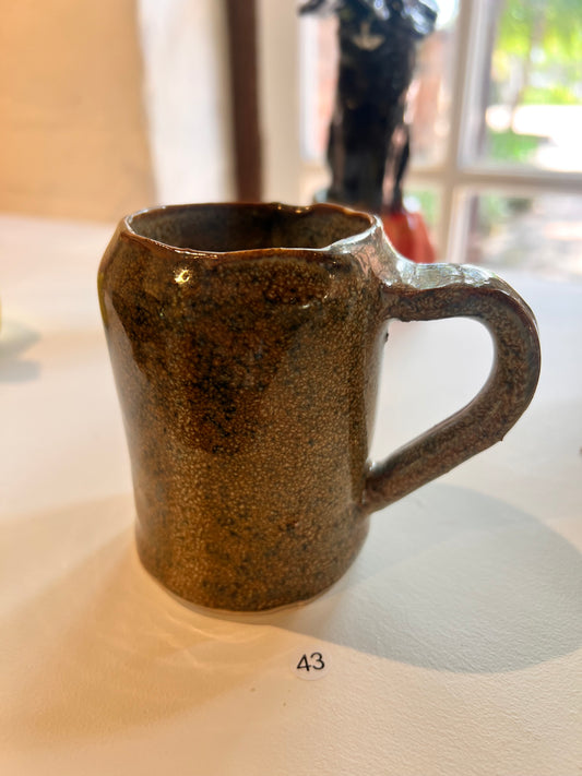 43. Isabella Walsh, 2025 Friday 5B, "Wiggly Mug". ceramic, stoneware